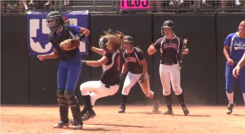 Women's high school softball catcher levels players with her elbow