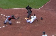 Starling Marte steals home after a pickoff attempt