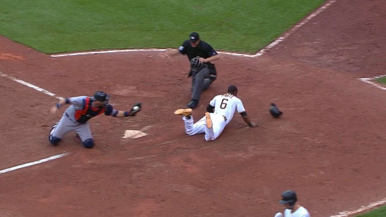 Starling Marte steals home after a pickoff attempt