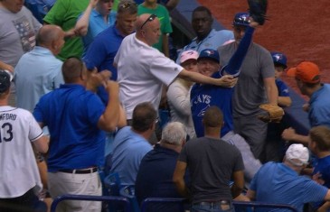 Unbelievable: Josh Donaldson flies into the stands to make the catch