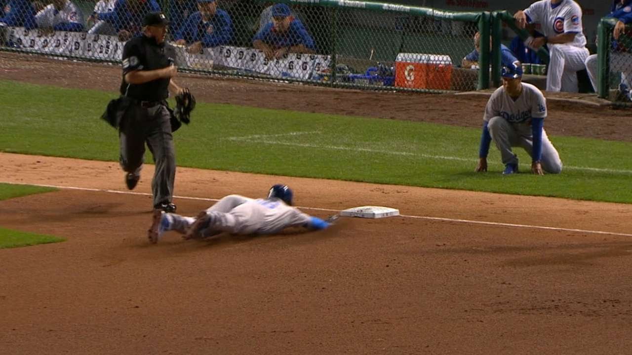 Yasiel Puig triples after Cubs lose sight of ball