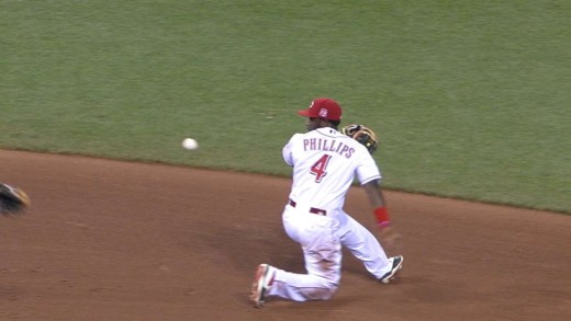 Brandon Phillips makes behind-the-back flip for the out