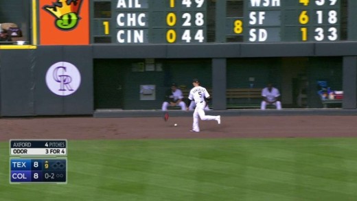 Carlos Gonzalez throws glove at Odor’s foul ball