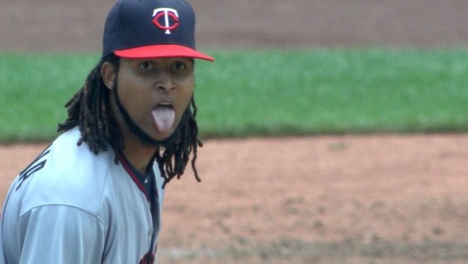 Ervin Santana sticks his tongue out at Eric Hosmer