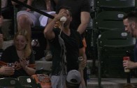Fan gets foul ball stuck in his beer cup