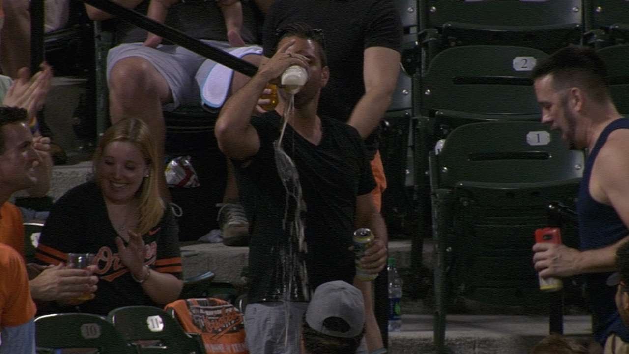 Fan gets foul ball stuck in his beer cup
