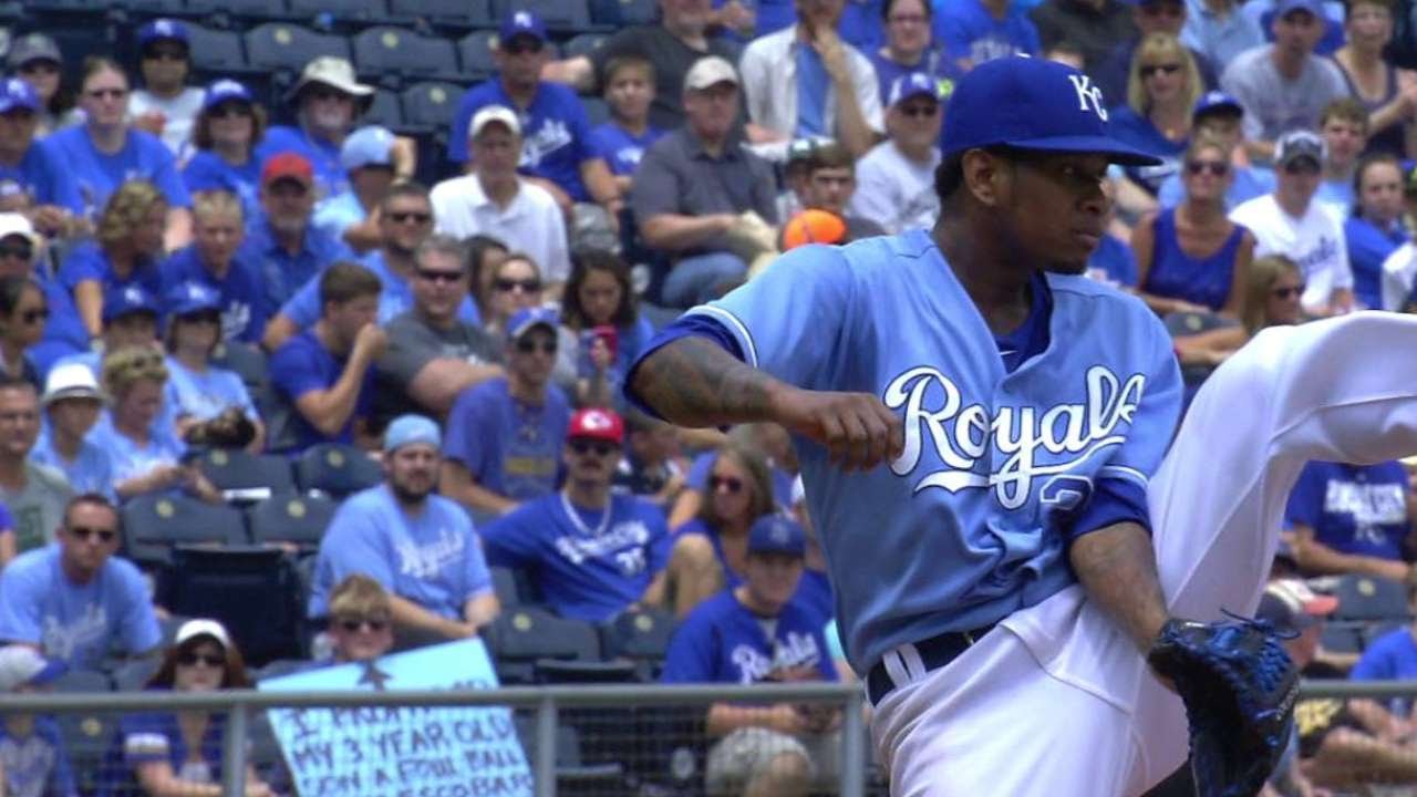 Yordano Ventura kicks a ball to second base for the out