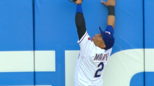 Leonys Martin leaps to rob Teixeira of a homer