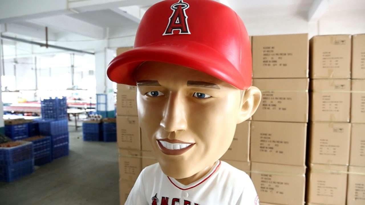 Mike Trout signs life-size bobblehead of himself