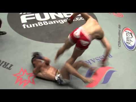 MMA fighter does a flip & kicks opponent in the groin on landing