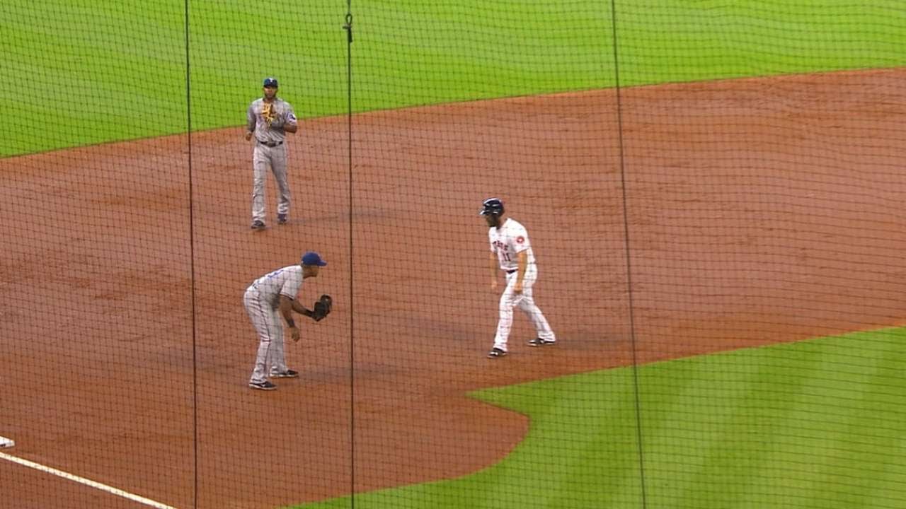 Stand Still: Adrian Beltre waits to tag out Gattis in the 2nd