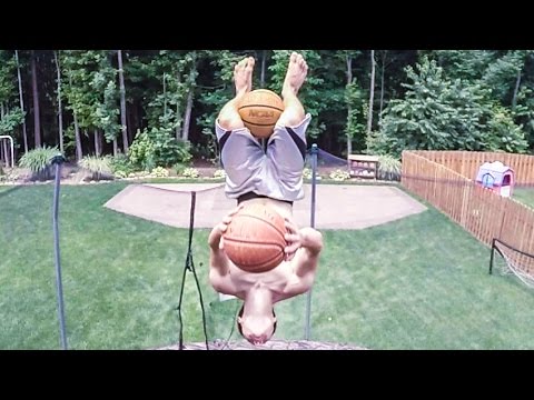 Wow: Double flip trick shot with two basketballs