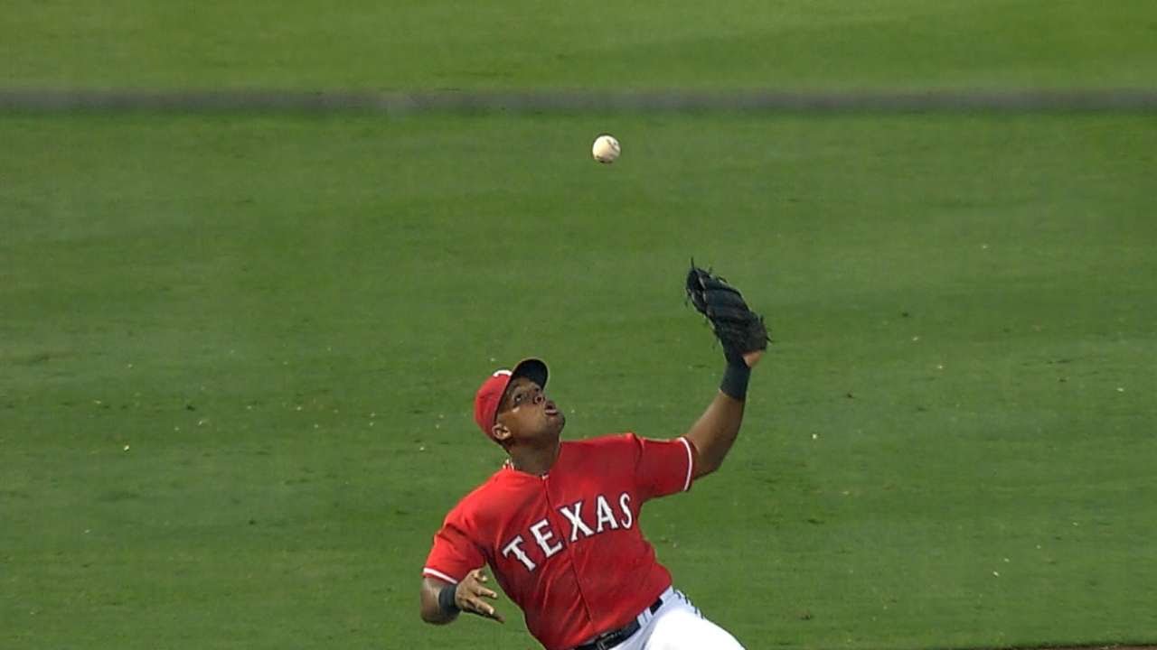Adrian Beltre makes a bare handed catch by tipping a line drive to himself