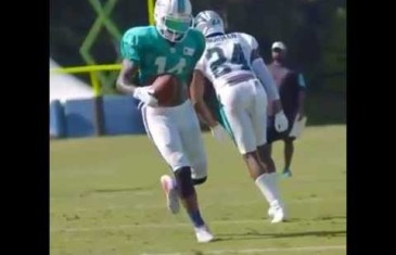 Dolphins WR Jarvis Landry goes behind the back on a juke with the football