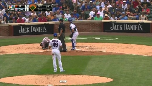 Giants outfielder Nori Aoki hit in the head with a fastball