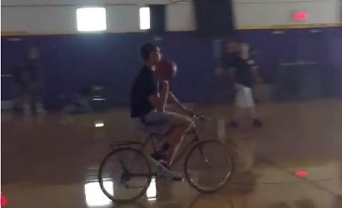 Klay Thompson hits half court shot on his bike