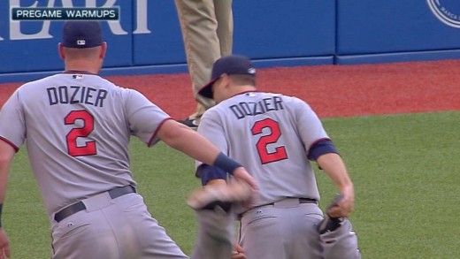 Twins pitcher Mike Pelfrey mimics Brian Dozier & wears his uniform!