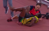 Usain Bolt gets taken out by a camera man