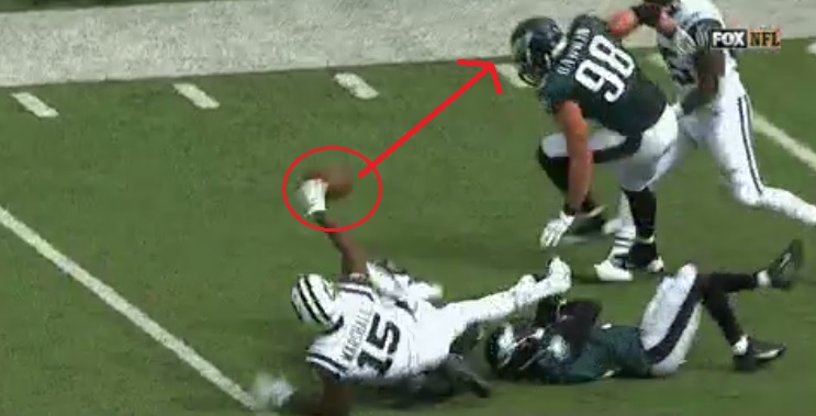 Bonehead Play: Brandon Marshall laterals after making a catch causing fumble