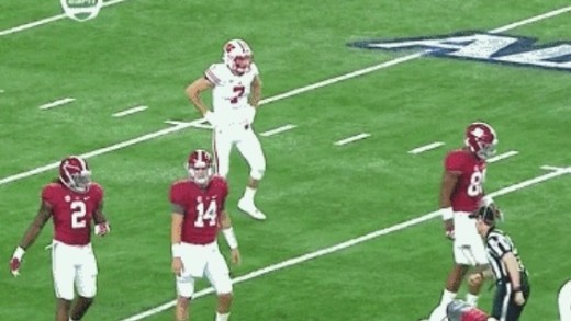 Scary: Wisconsin safety Michael Caputo lines up in Alabama backfield after head injury