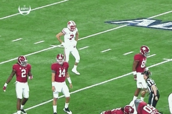 Scary: Wisconsin safety Michael Caputo lines up in Alabama backfield after head injury