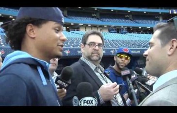Chris Archer sneaks into a scrum to interview David Price