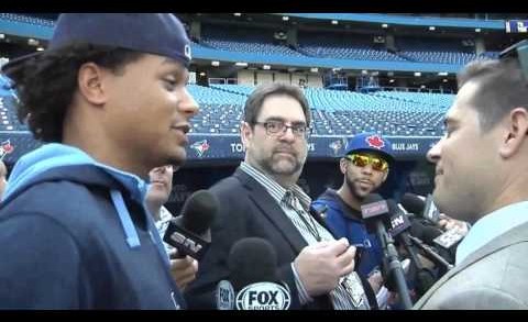 Chris Archer sneaks into a scrum to interview David Price