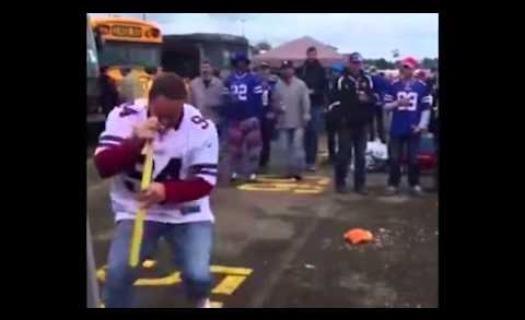 Damn: Buffalo Bills fan plays spinning drinking wiffle bat game & goes head first into bus