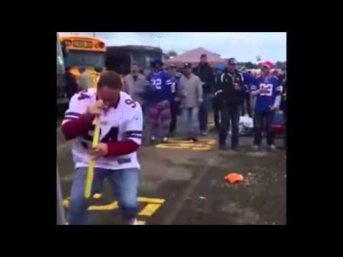 Damn: Buffalo Bills fan plays spinning drinking wiffle bat game & goes head first into bus