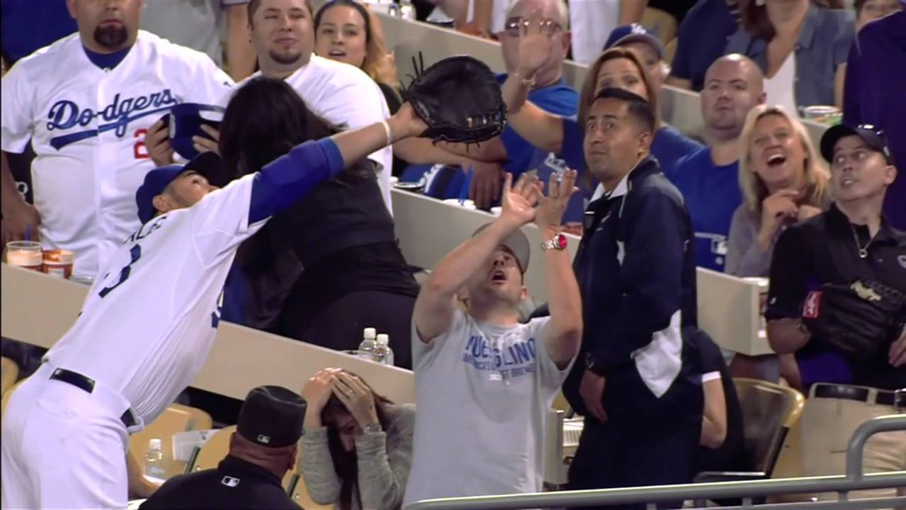 Fan fights with Adrian Gonzalez for a foul ball
