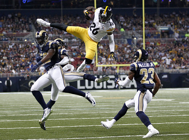 Le'Veon Bell soars like superman in the air with an impressive hurdle