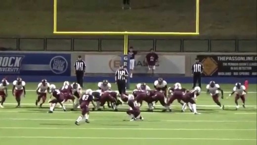 High school kicker hits ref in the head with kick for a PAT convert