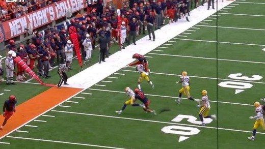 Syracuse punter hurdles defender & almost punches another