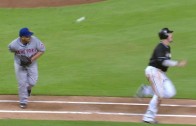 Mercy: Bartolo Colon makes a behind-the-back flip to record the out