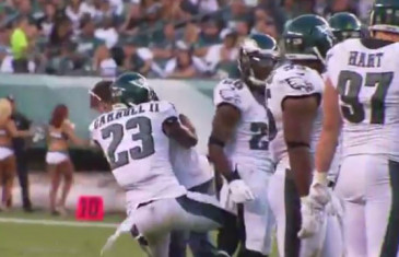 Eagles CB Nolan Carroll tackles a fan who runs onto the field