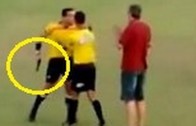 Referee pulls out a gun during football match in Brazil