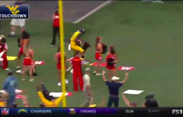 West Virginia WR Shelton Gibson plows through Maryland cheerleaders after TD