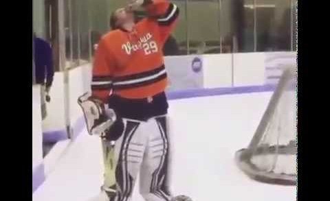 Virgina hockey goalie chugs a beer while on the ice & gets ejected