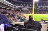 White Sox fan throws up the middle finger when the wave comes around