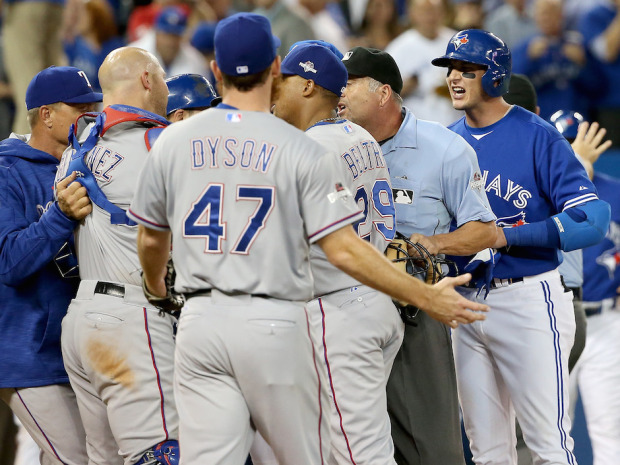 Rangers pitcher Sam Dyson taps Troy Tulowitzki causing benches to clear again
