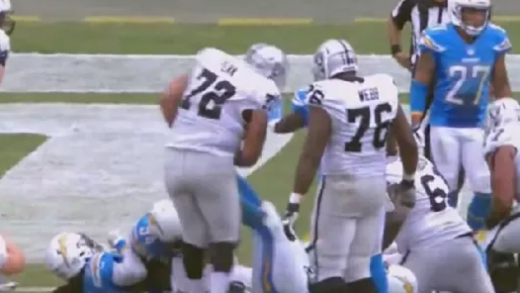 Chargers’ Corey Liuget kicks Raiders’ Donald Penn in the stomach