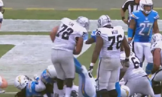 Chargers' Corey Liuget kicks Raiders' Donald Penn in the stomach