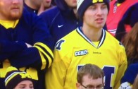 Angry Michigan fan flips off the camera