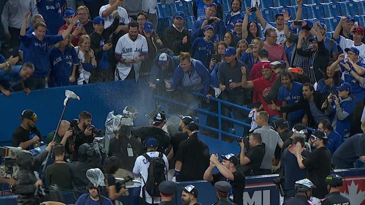 Blue Jays players soak fans with champagne