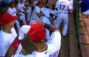 Elvis Andrus jokes around with Prince Fielder in the dugout
