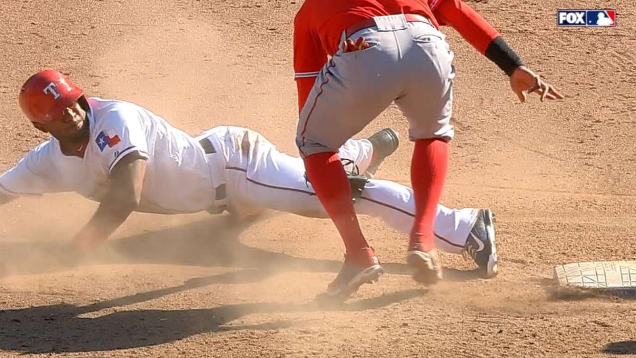 Erick Aybar alertly tags Elvis Andrus to end the game
