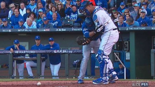 Ben Revere & Salvador Perez hug it out after a ball in the dirt