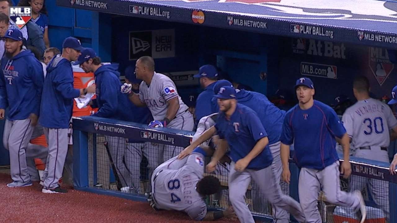 Prince Fielder takes a big mans tumble over the railing