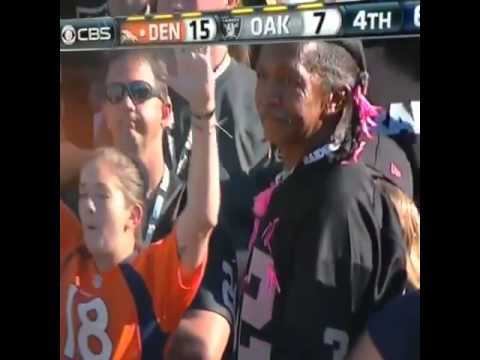 Raiders fan forces Broncos fan to stop cheering