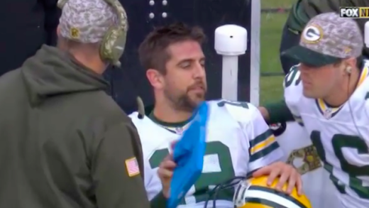 Aaron Rodgers throws a tablet on the ground